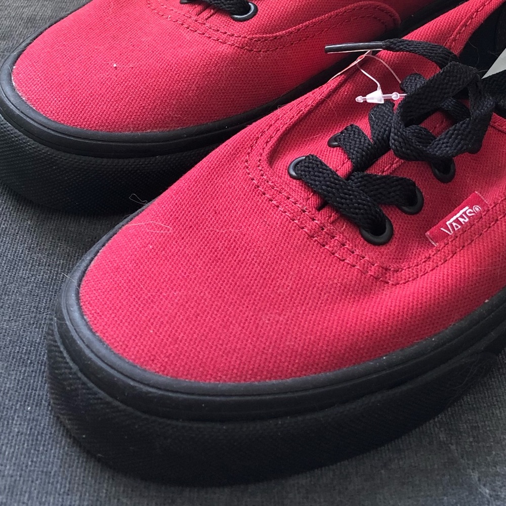 Red and black Vans Authentics